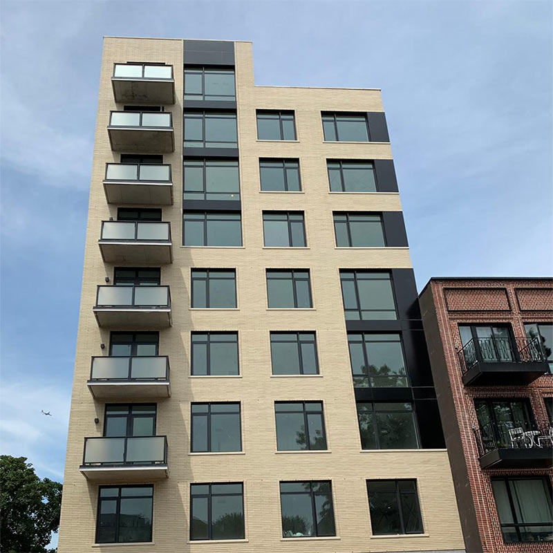Mid-rise New York City residential building with aluminum window wall system
