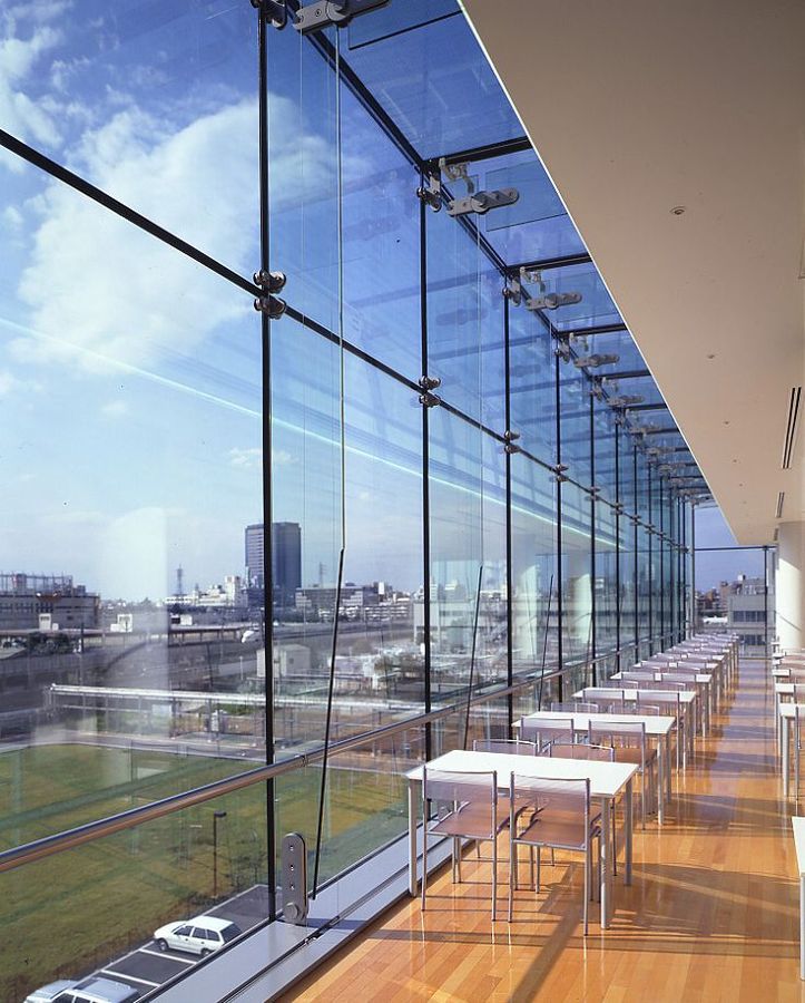 Floor-to-ceiling curtain wall glazing with Manhattan skyline views