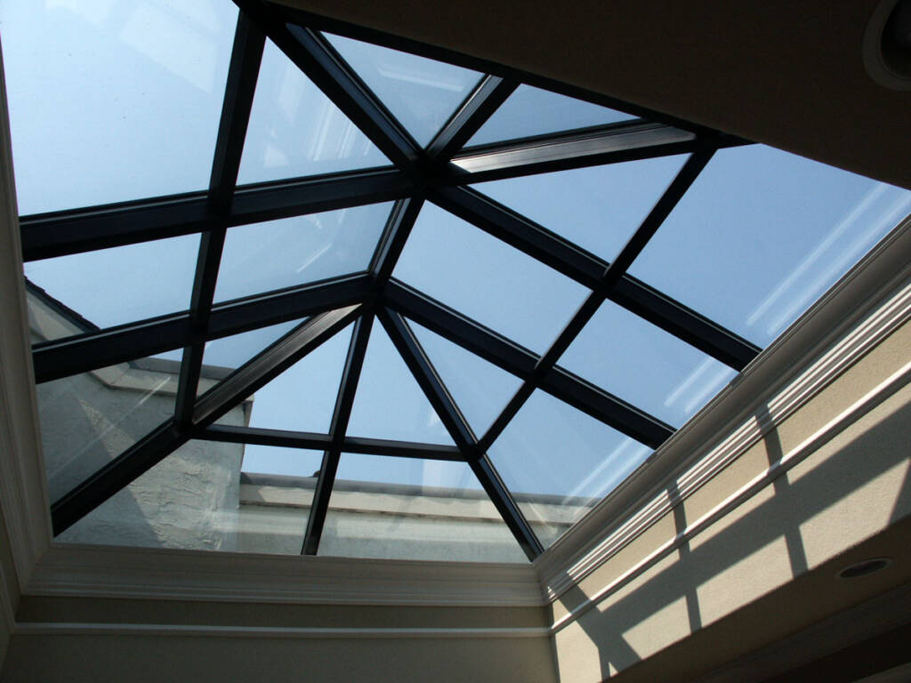 Skylight Leak Repair in NYC: Fix It Before Winter 5 Interior view of a glass skylight in a New York City home